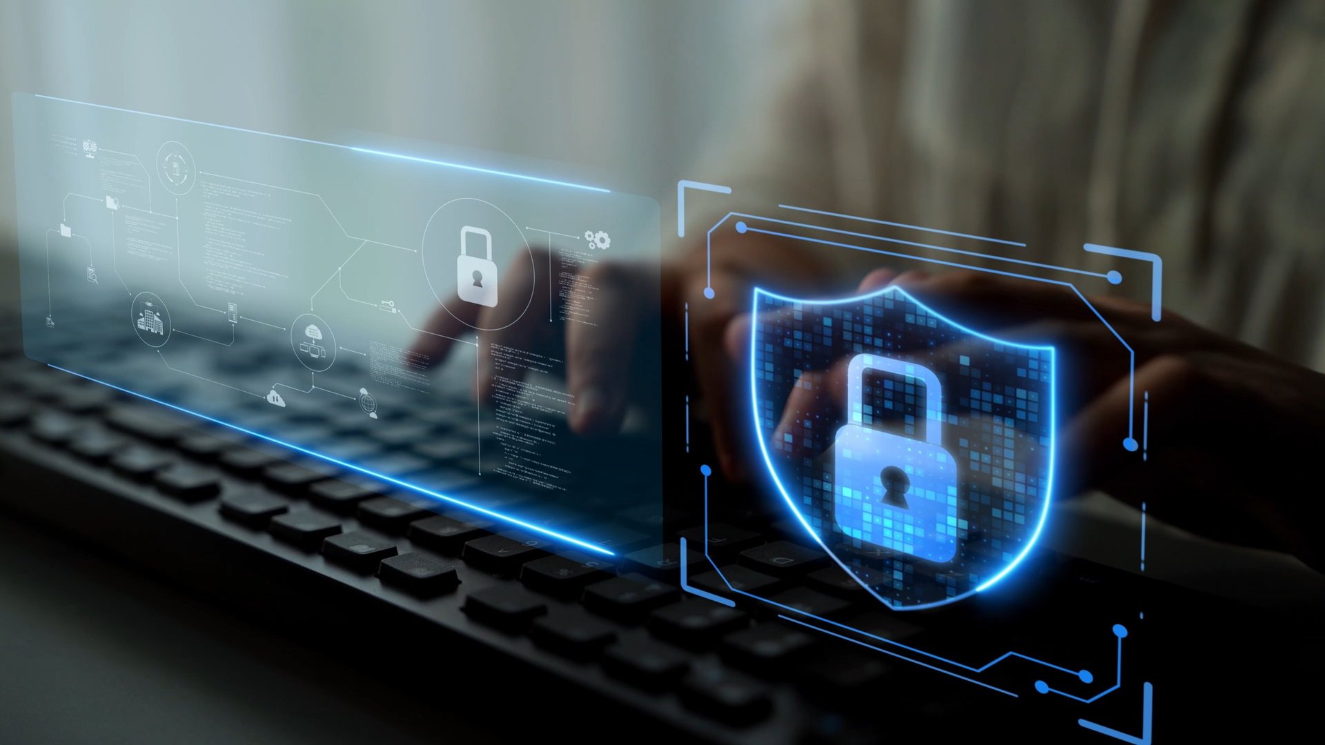 User typing on keyboard with digital security shield